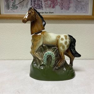 Vintage horse whisky bottle